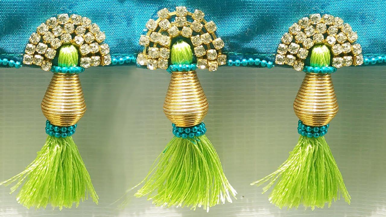 Saree kuchu design | Saree tassels designs, Saree kuchu designs, Bead  designs