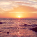 Wschód Słońca na Plaży Tapeta Icon